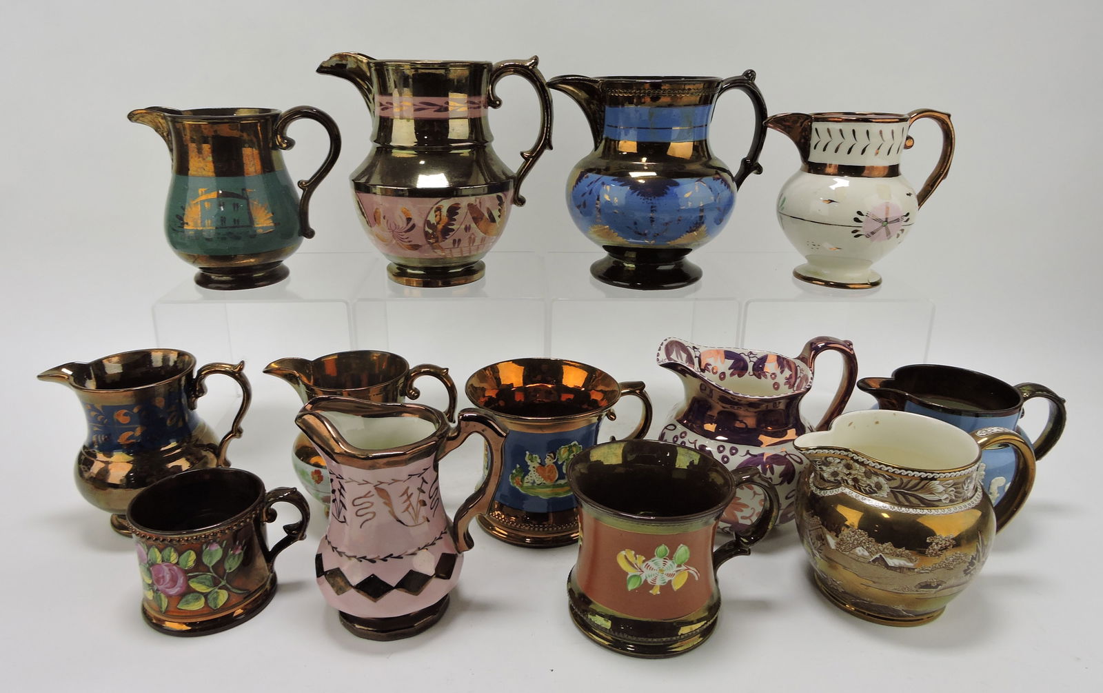 Lot of 13 copper and luster pitchers (1 of 1)