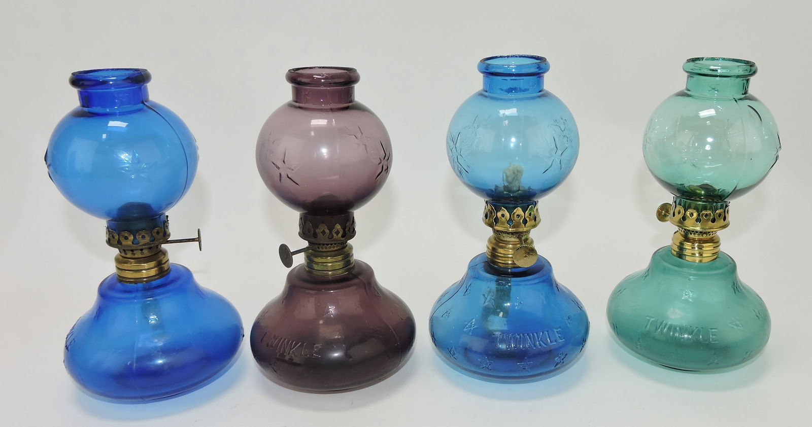Lot of 4 'Twinkle' miniature lamps, (1 of 1)
