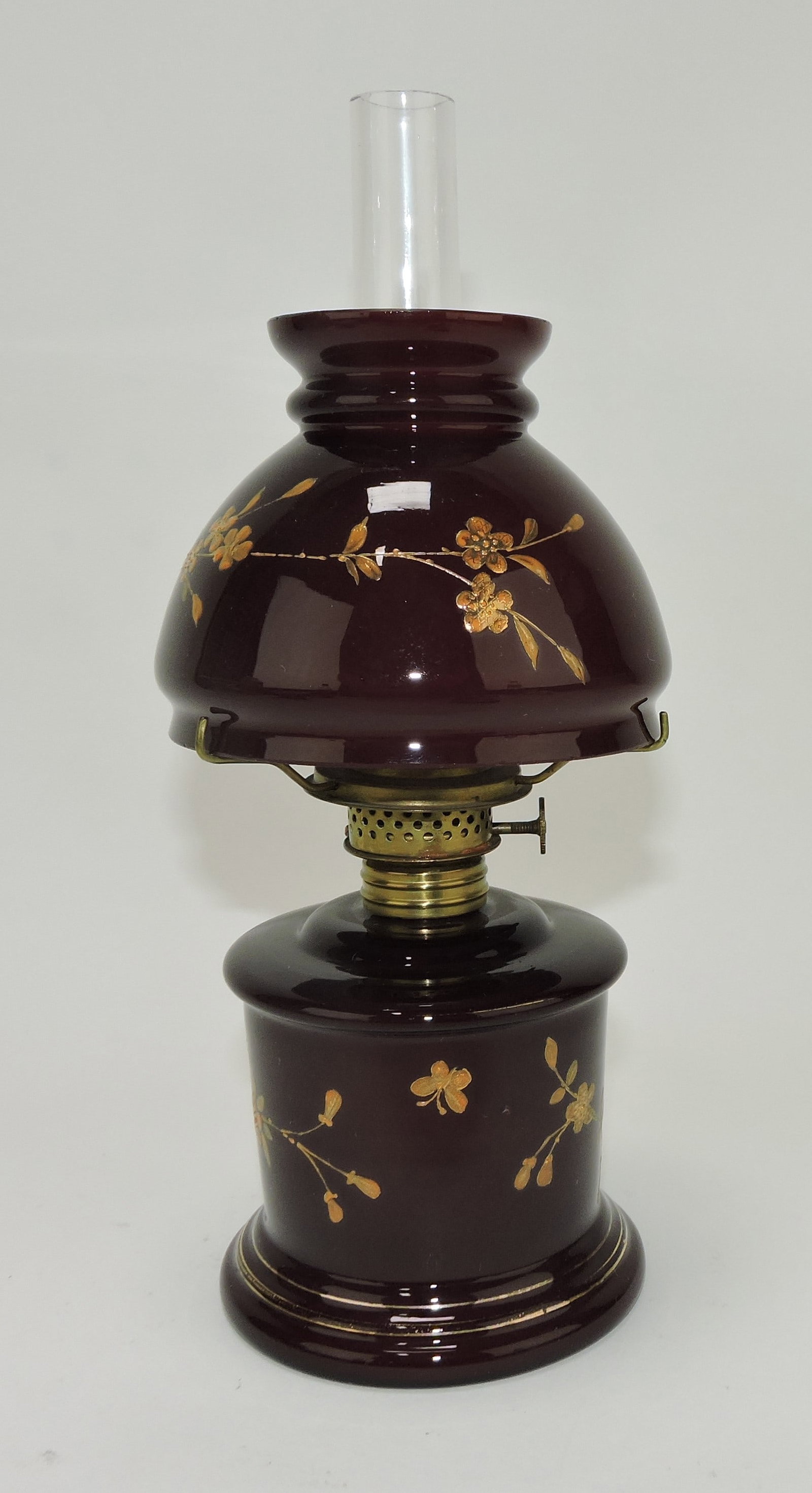 Dark red cased glass gold floral: enamel miniature lamp, Smith 1 fig 391, 8 1/2"