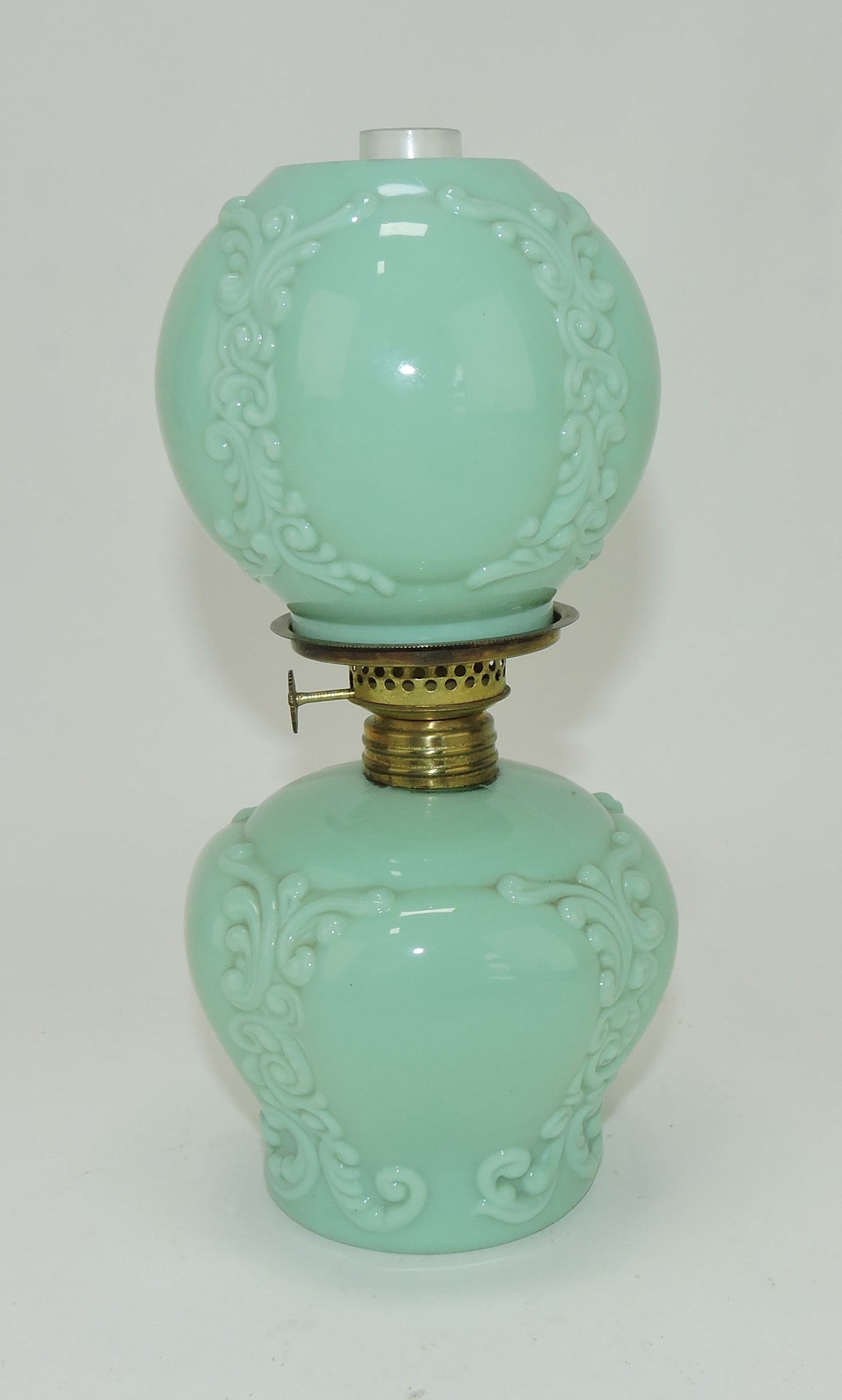 Green opaque miniature lamp with: embossed design, Smith 1 fig 234, 8 1/2"