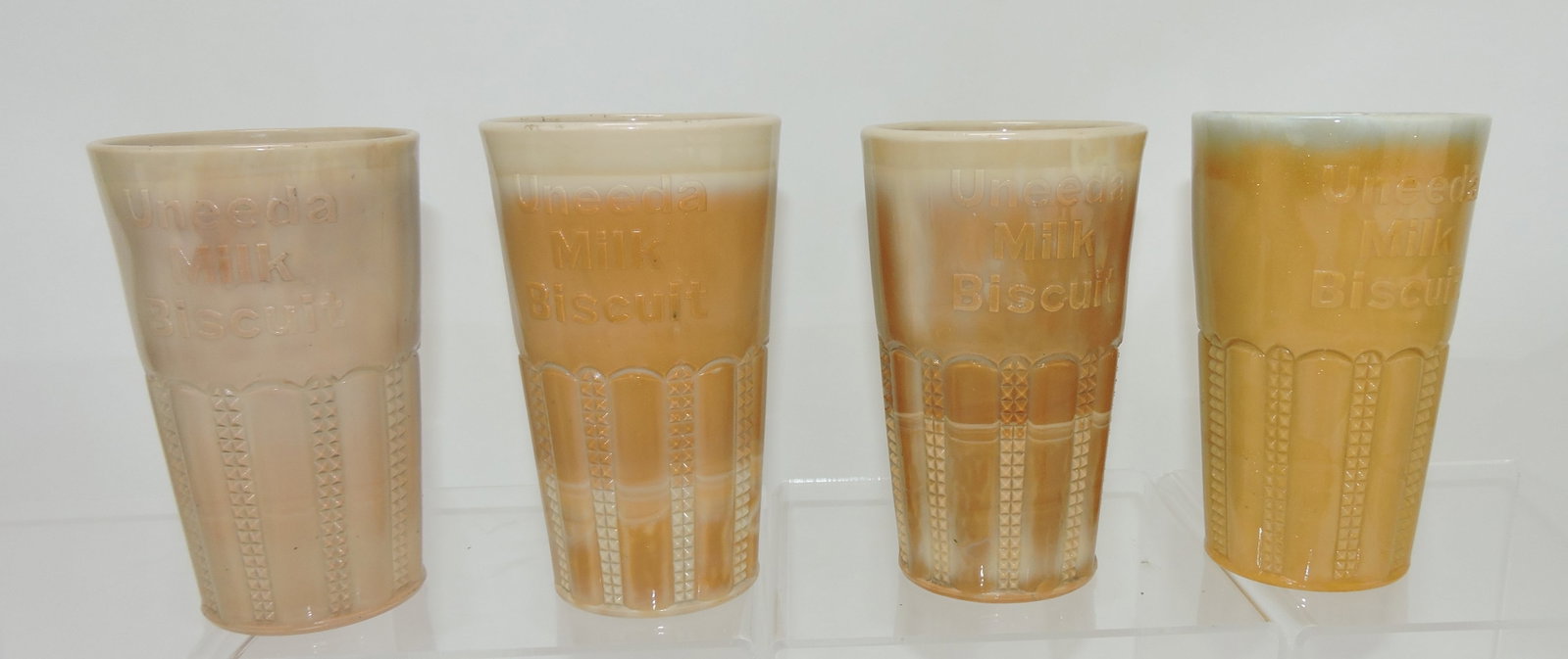 Greentown chocolate lot of 4: Uneeda Milk Biscuit tumblers