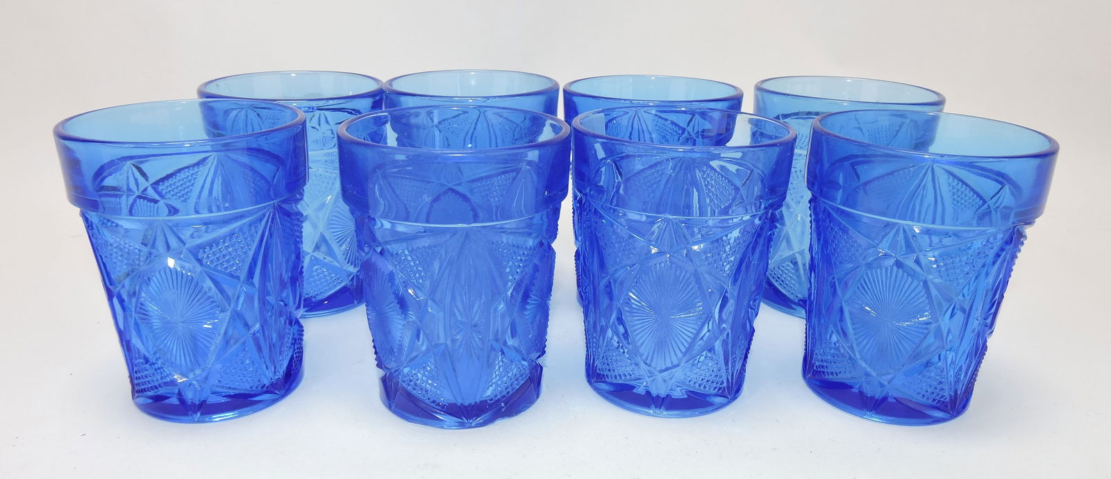 Greentown blue set of 8 Brazen: Shield tumblers