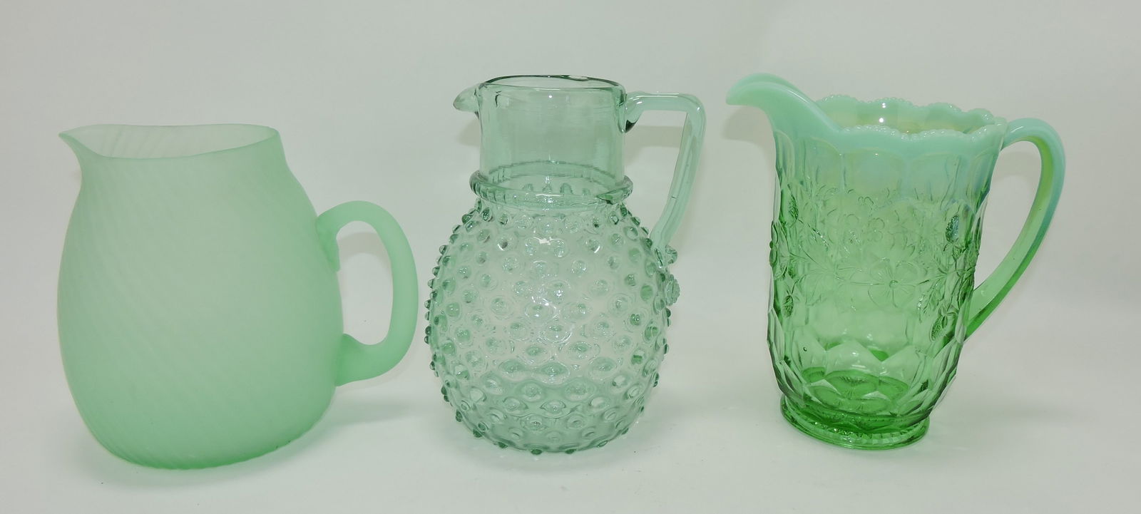 Lot of 3 green glass pitchers, 7 to 8 1/2" (1 of 1)