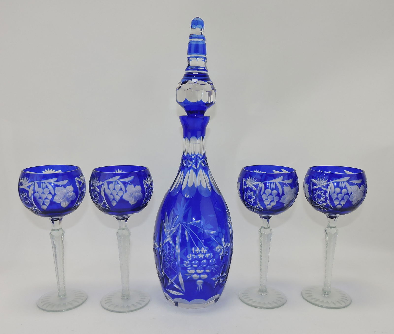 Blue cut to clear Bohemian decanter: 17 1/2", and 4 - 8 1/2" goblets