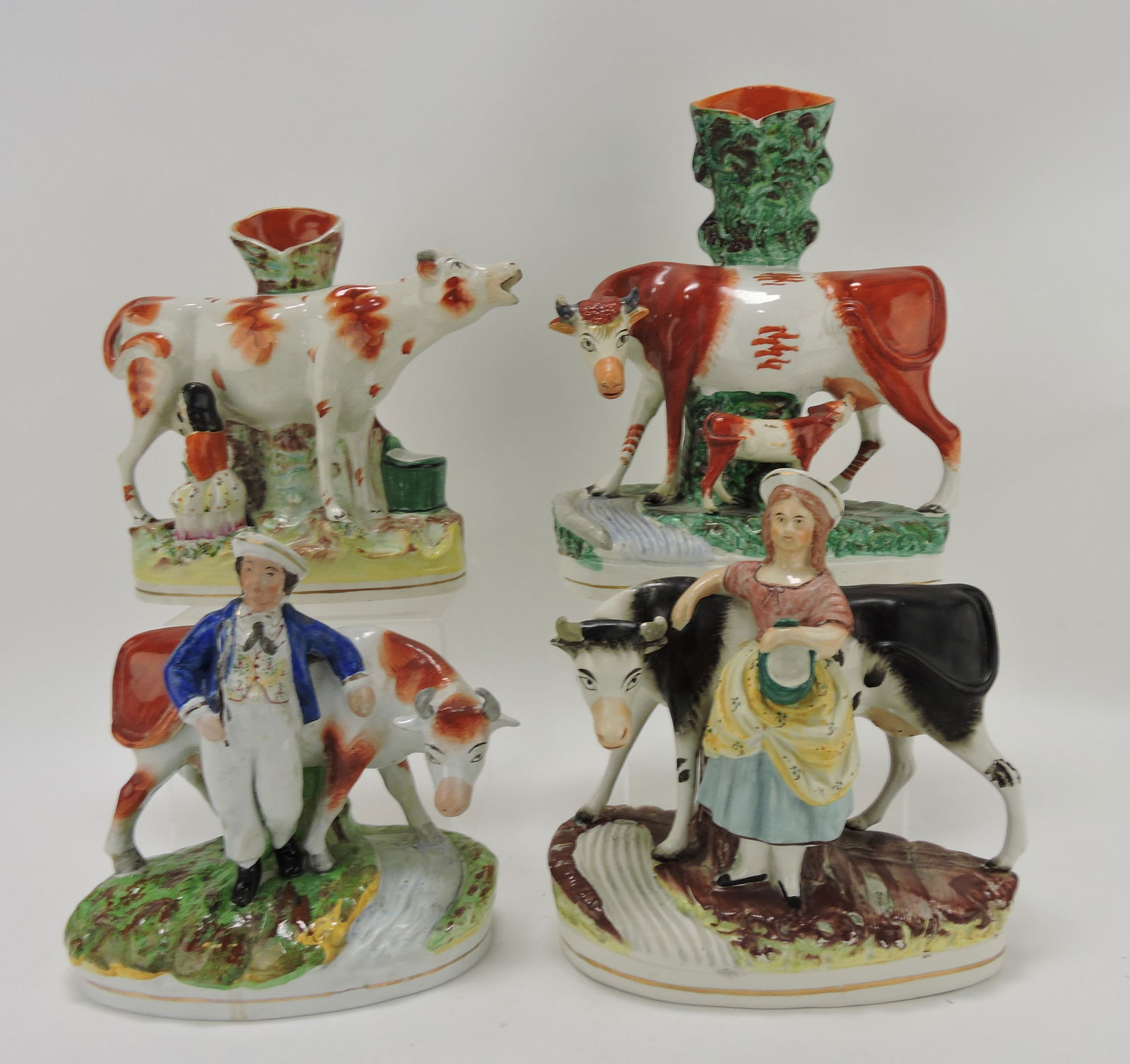 Staffordshire lot of 4 cow figures, (1 of 1)