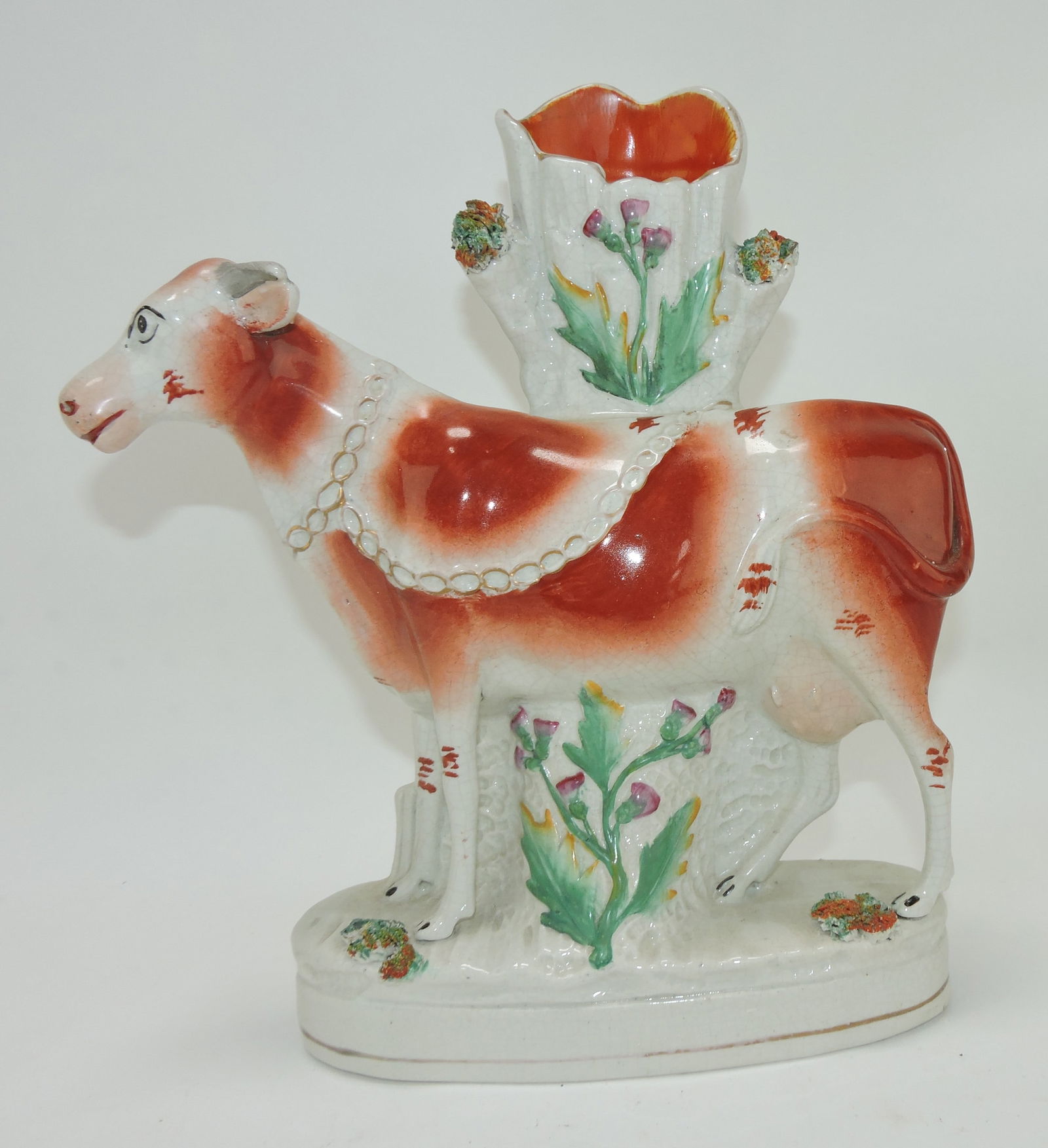 Staffordshire cow with chain spill (1 of 1)