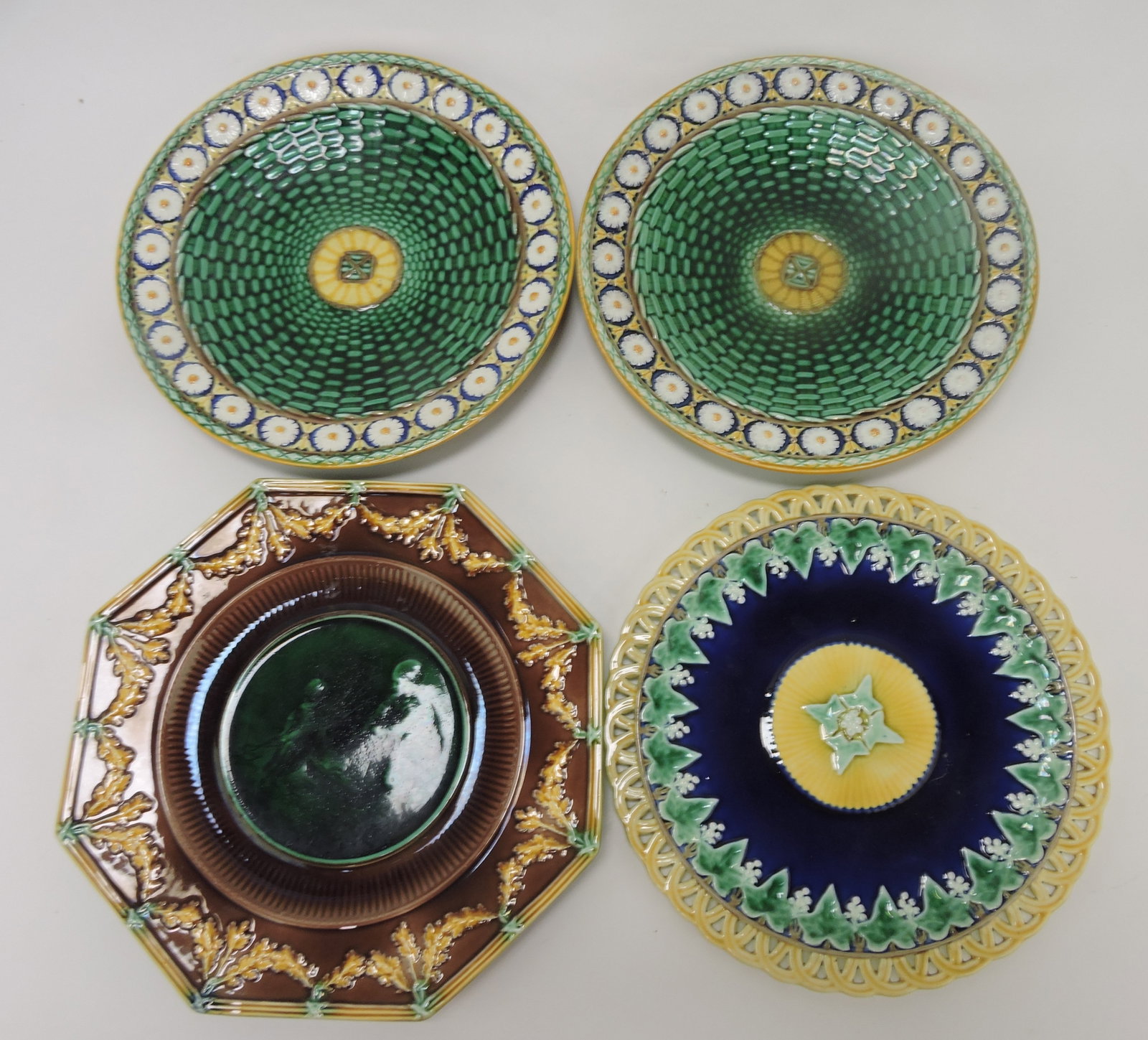 Wedgwood majolica lot of 4 plates;: Joan Stacke-Graham Collection