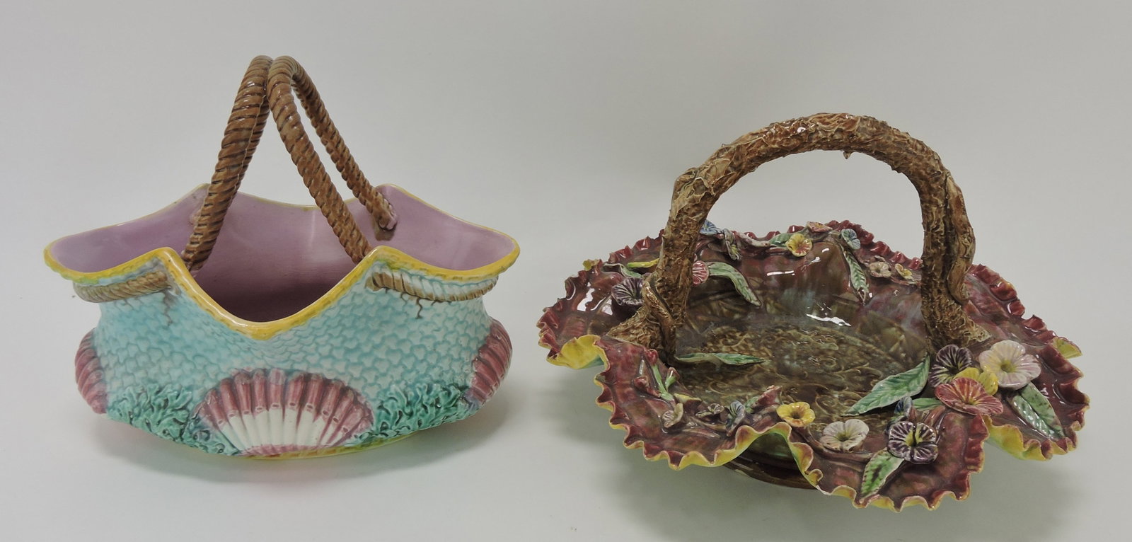 Majolica shells basket (professional: rim repair) and basket with applied flowers, some losses