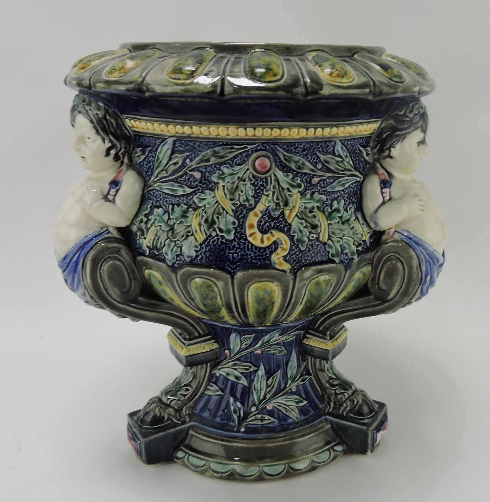 European majolica wine cooler, 13 1/2"h,: 12"w, base rim repair
