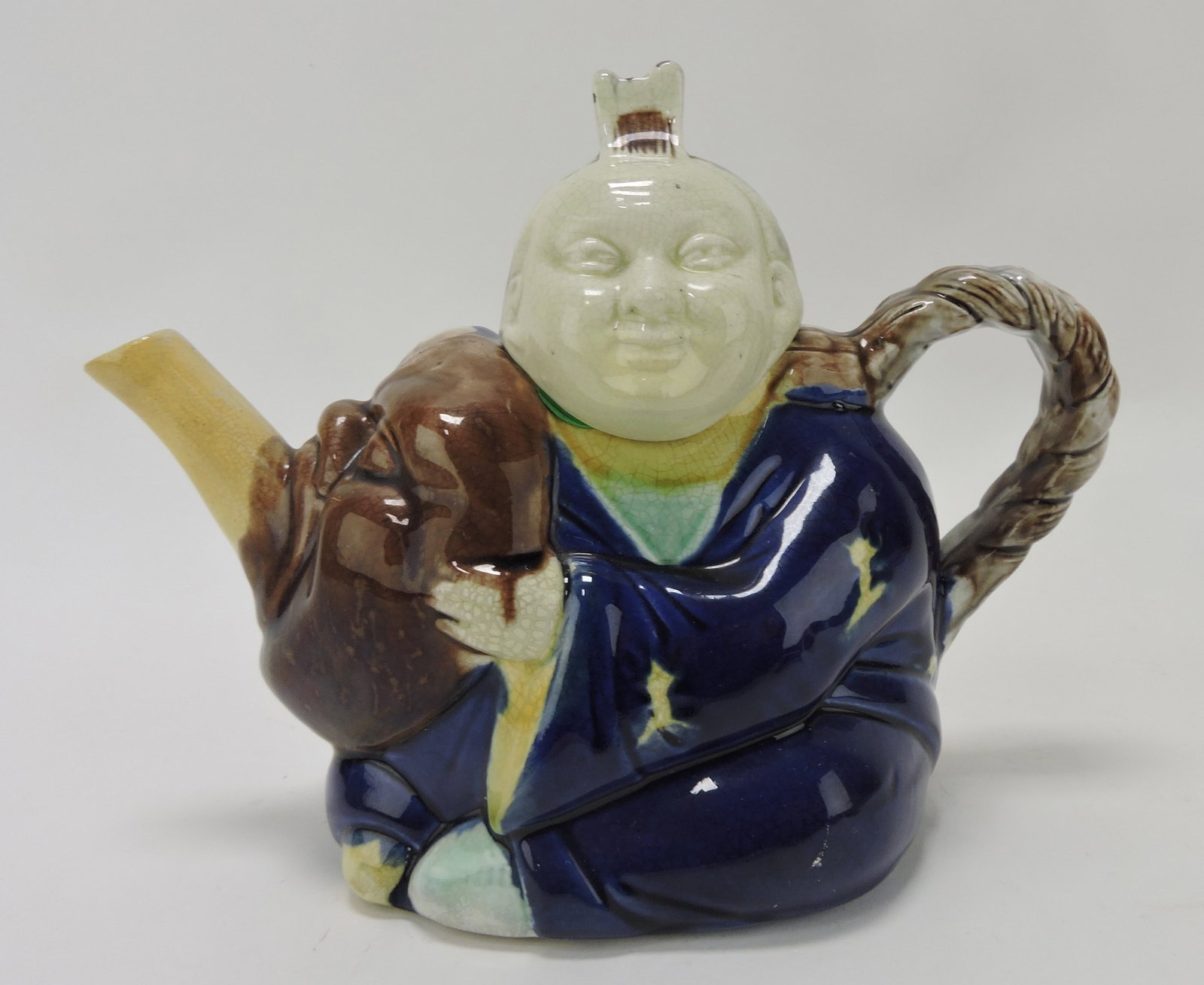 Majolica Chinaman with mask teapot;: Sue & Harry Thurmon Collection