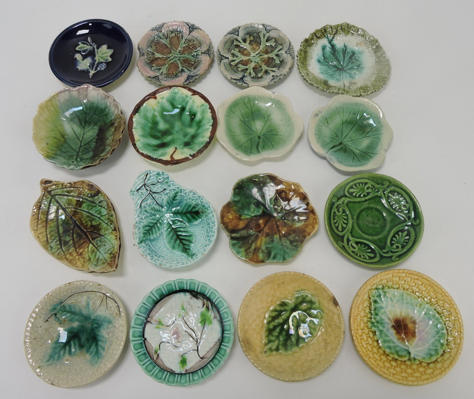 Majolica lot of 16 butter pats;: Sue & Harry Thurmon Collection