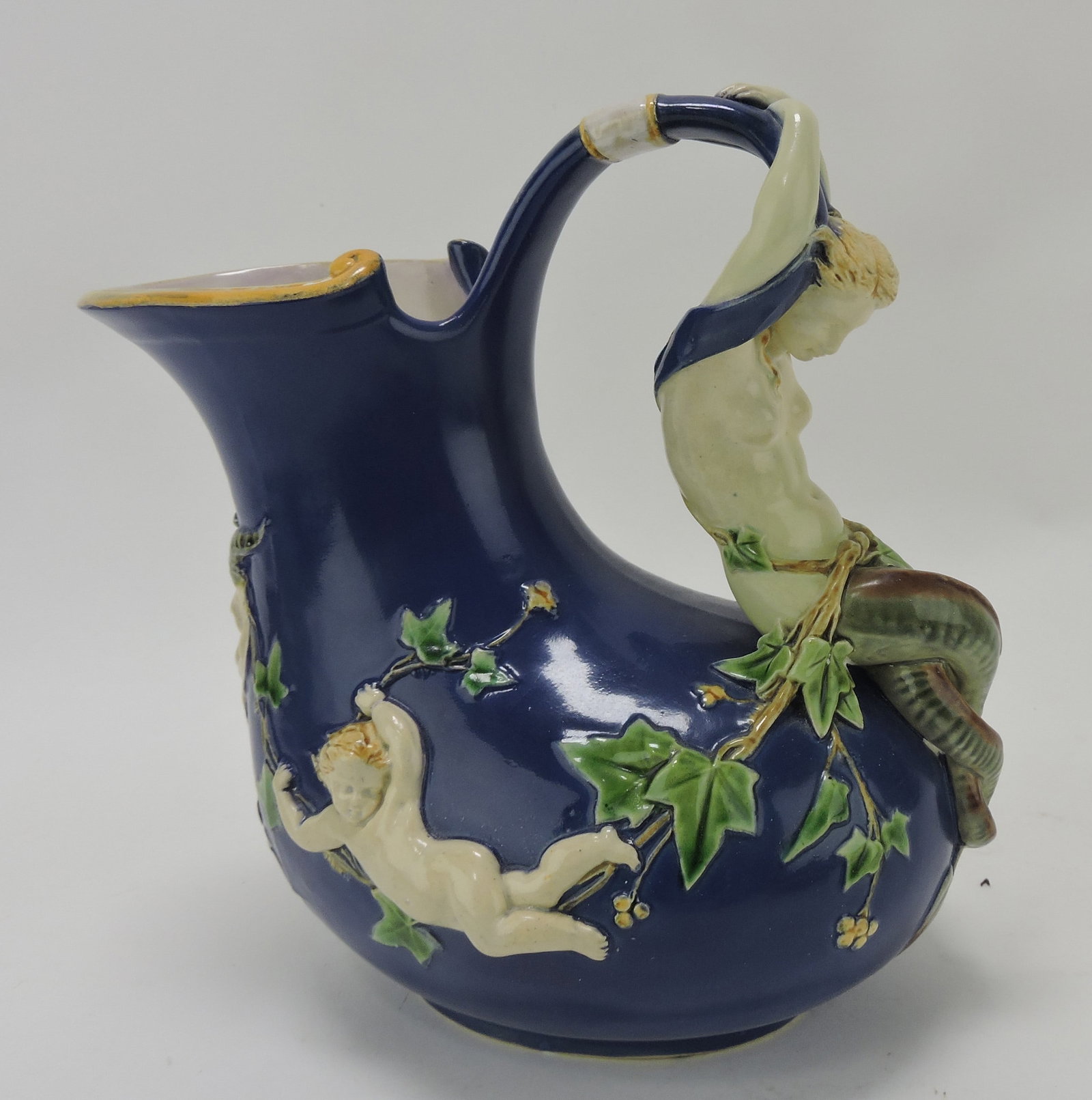 Minton majolica mermaid wine jug with: putti and vine, professional rim repair, 8"