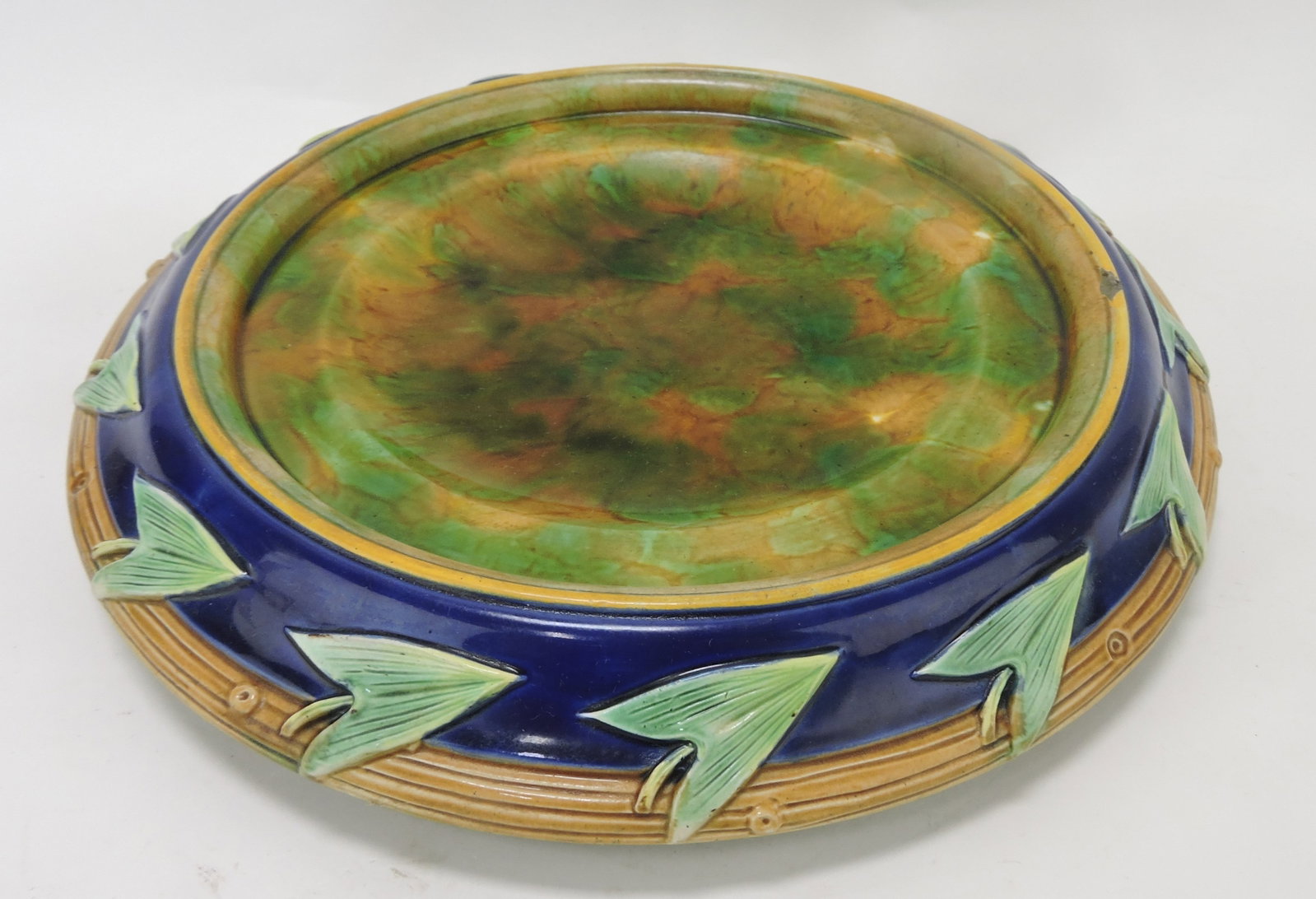 George Jones majolica lily pad: jardiniere undertray, 14"d, rim chip. Sue & Harry Thurmon Collection