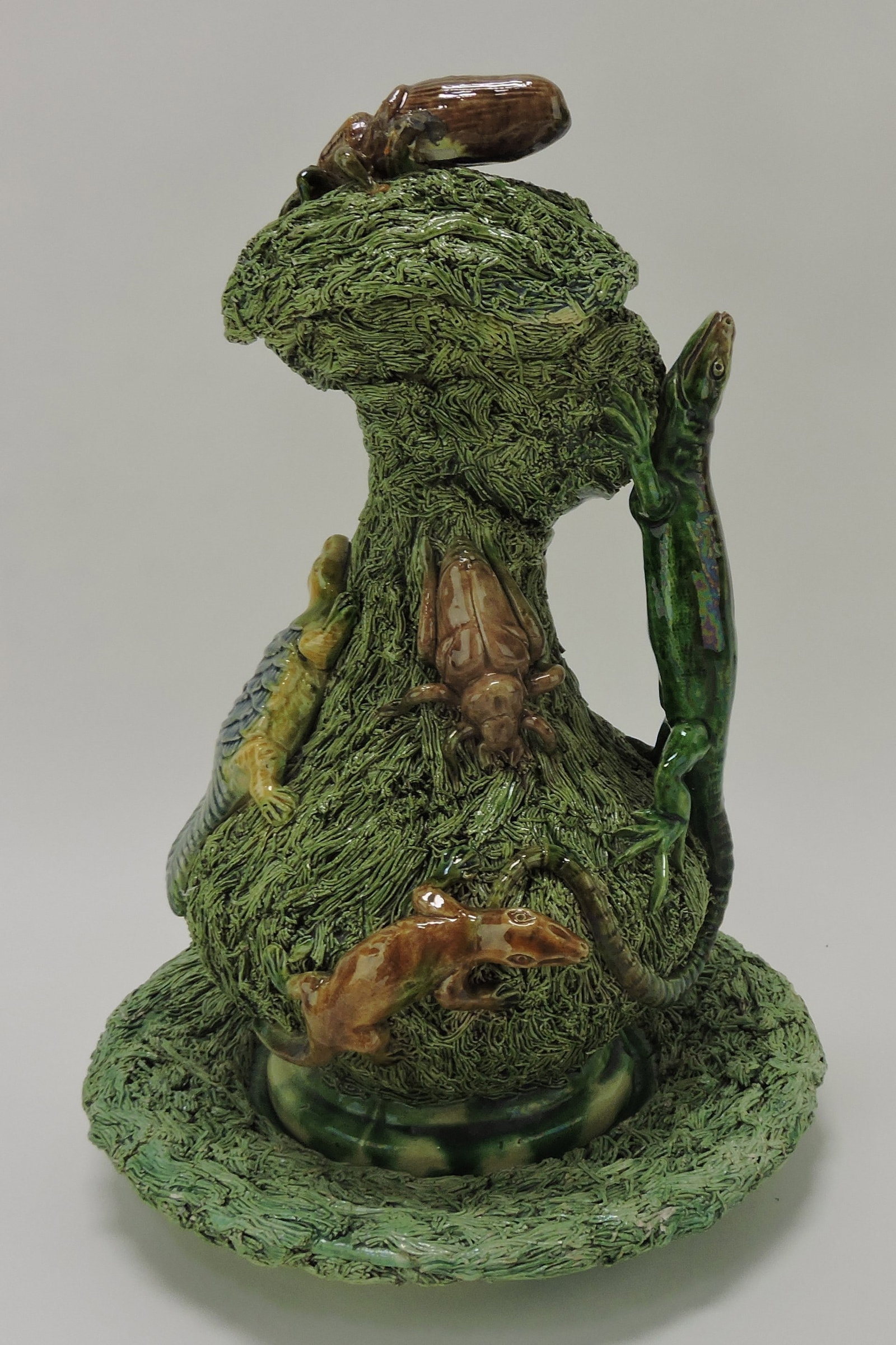 Portugal palissy cover jug with under: tray decorated with salamanders, lizards, turtle, beetle, and other creatures on green grass, some losses, 12". Sue & Harry Thurmon Collection