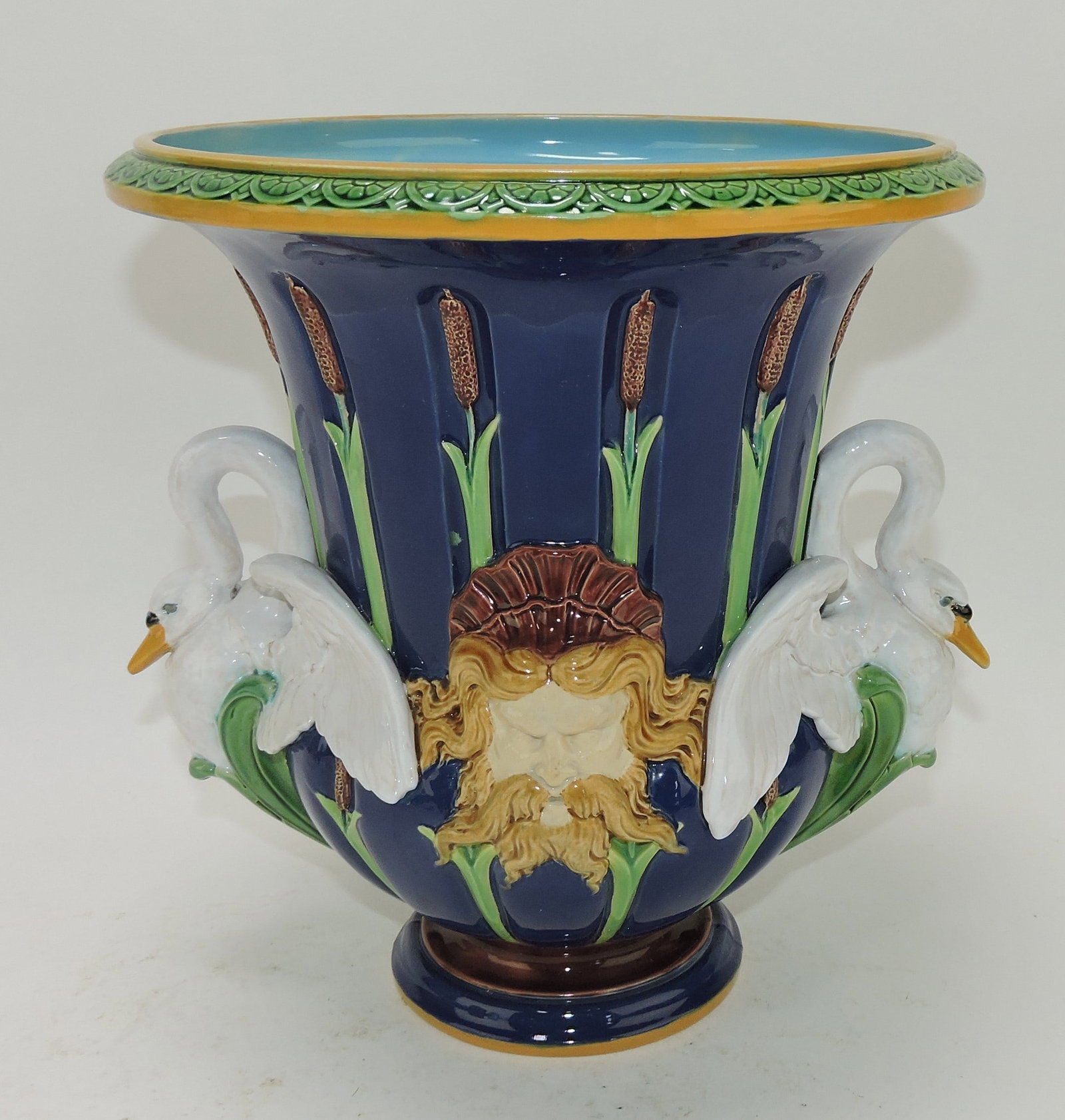 Minton majolica cobalt wine cooler: with swan handles and masks, shape no. 1405, 11"h, 11"w