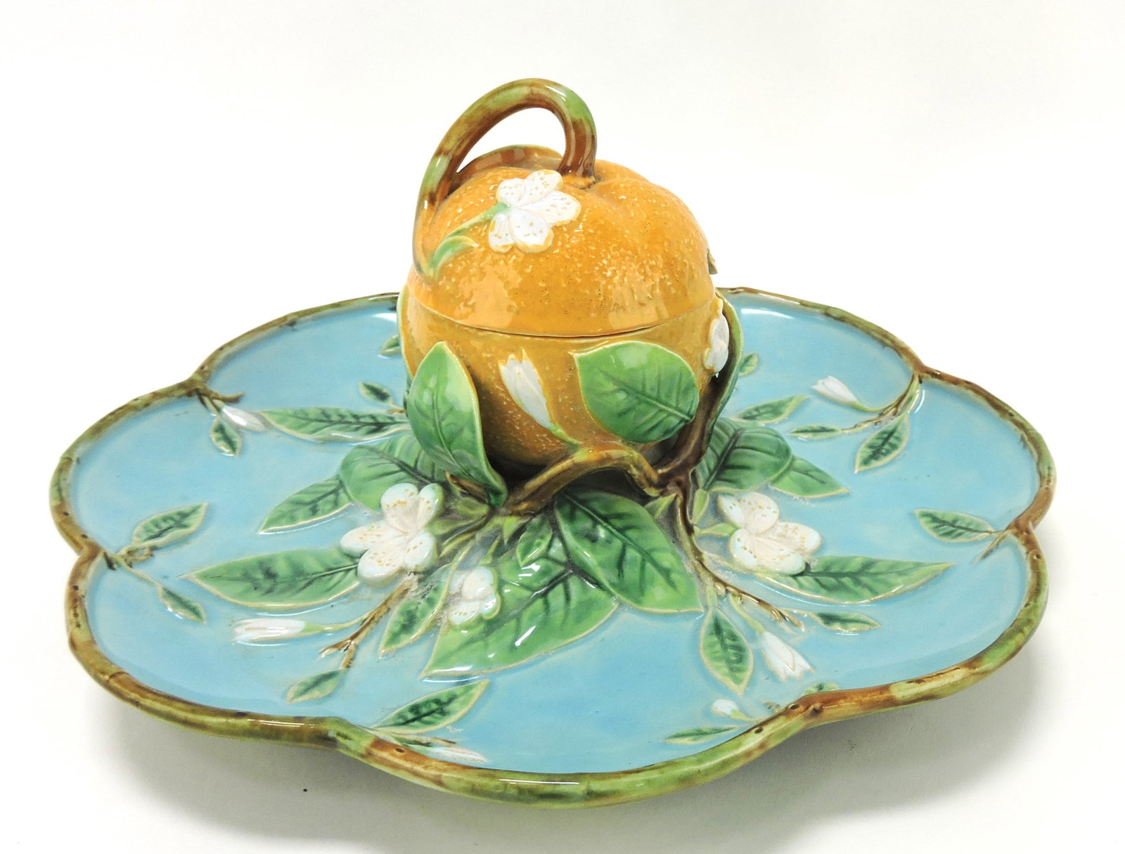 George Jones majolica marmalade: server with turquoise tray with leaves and blossoms, an orange jar in center, 11"d