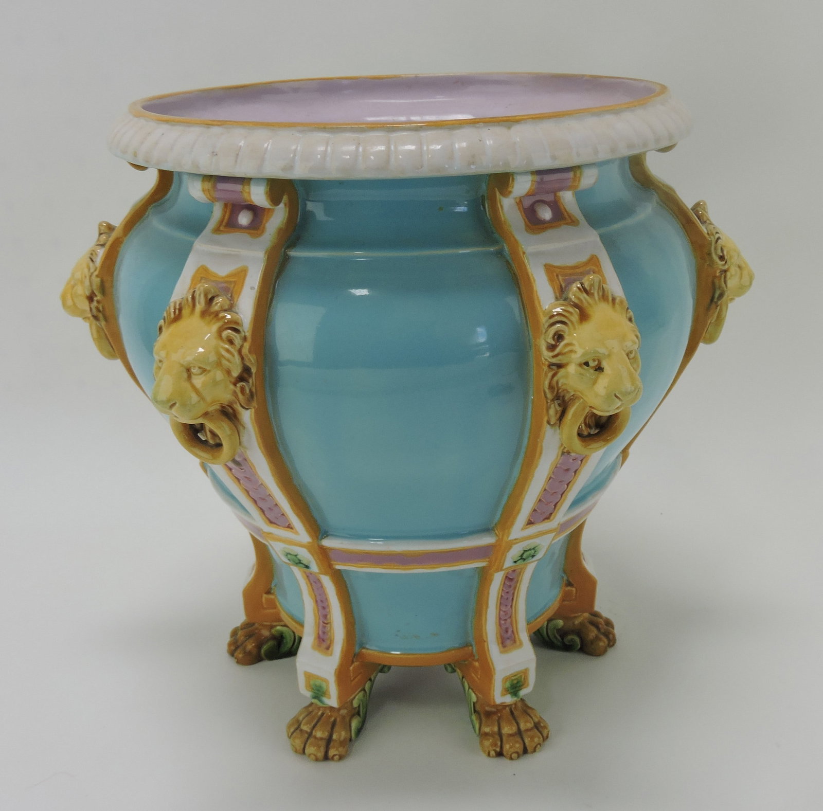 Minton majolica lion strap turquoise: jardiniere with paw feet, 11 1/2"h, professional repair to two feet
