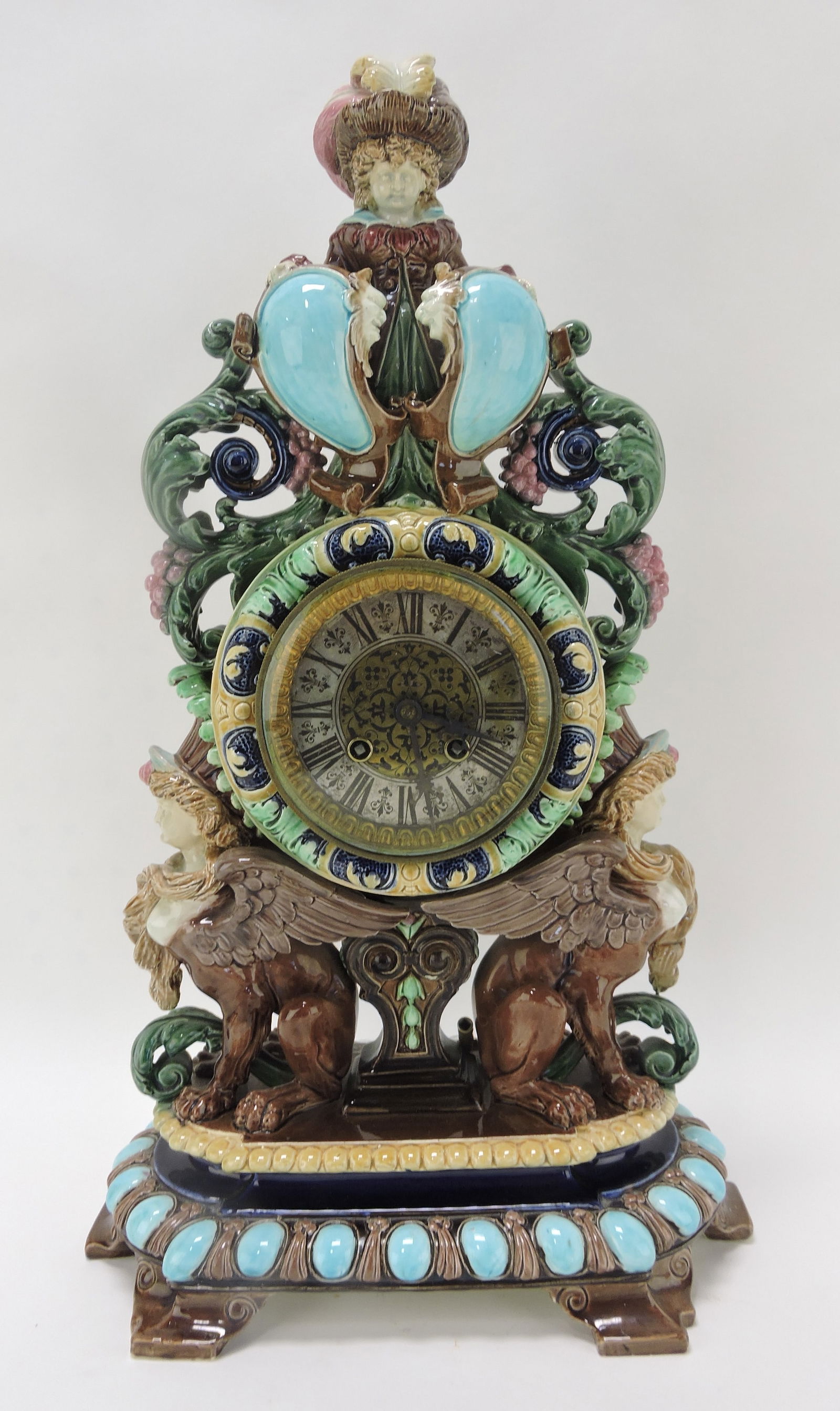 Hugo Lonitz majolica figural mantle: clock with lady finial, lacking back cover, 19 1/2"