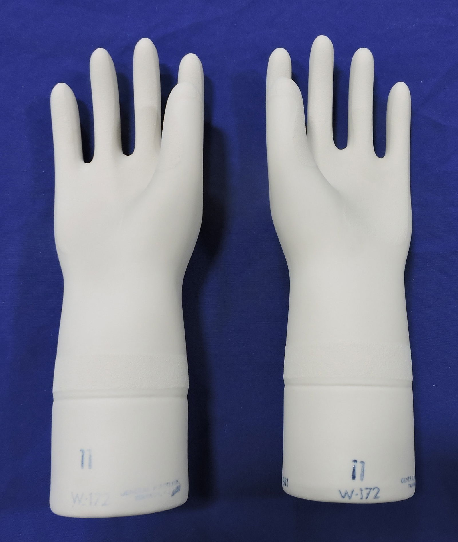 Hall China pair of glove molds, bisque,: size 11