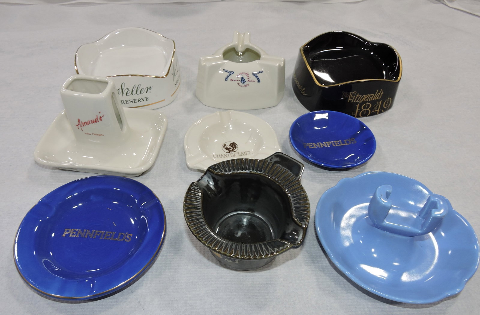 Hall China lot of 9 ashtrays, some with: advertising