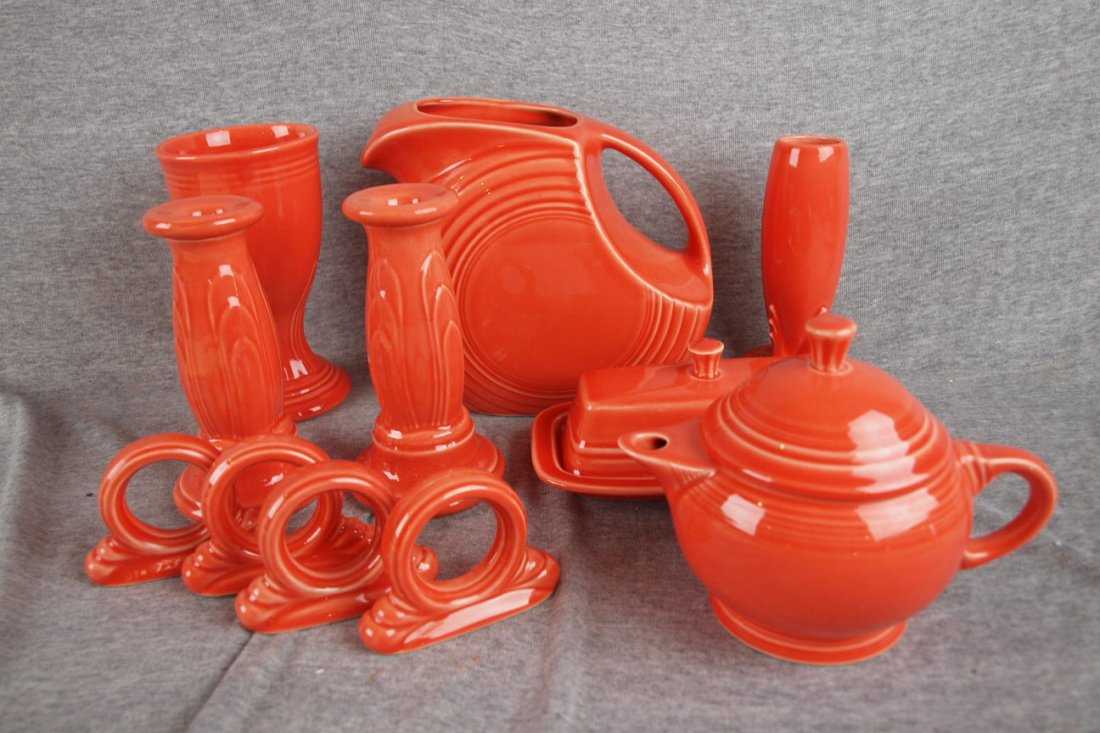 Fiesta persimmon lot of 7 pieces - goblet, disk: Fiesta persimmon lot of 7 pieces - goblet, disk water pitcher, bud vase, set of 4 napkin rings, pair tapered candle holders, butter dish and 2 cup teapot