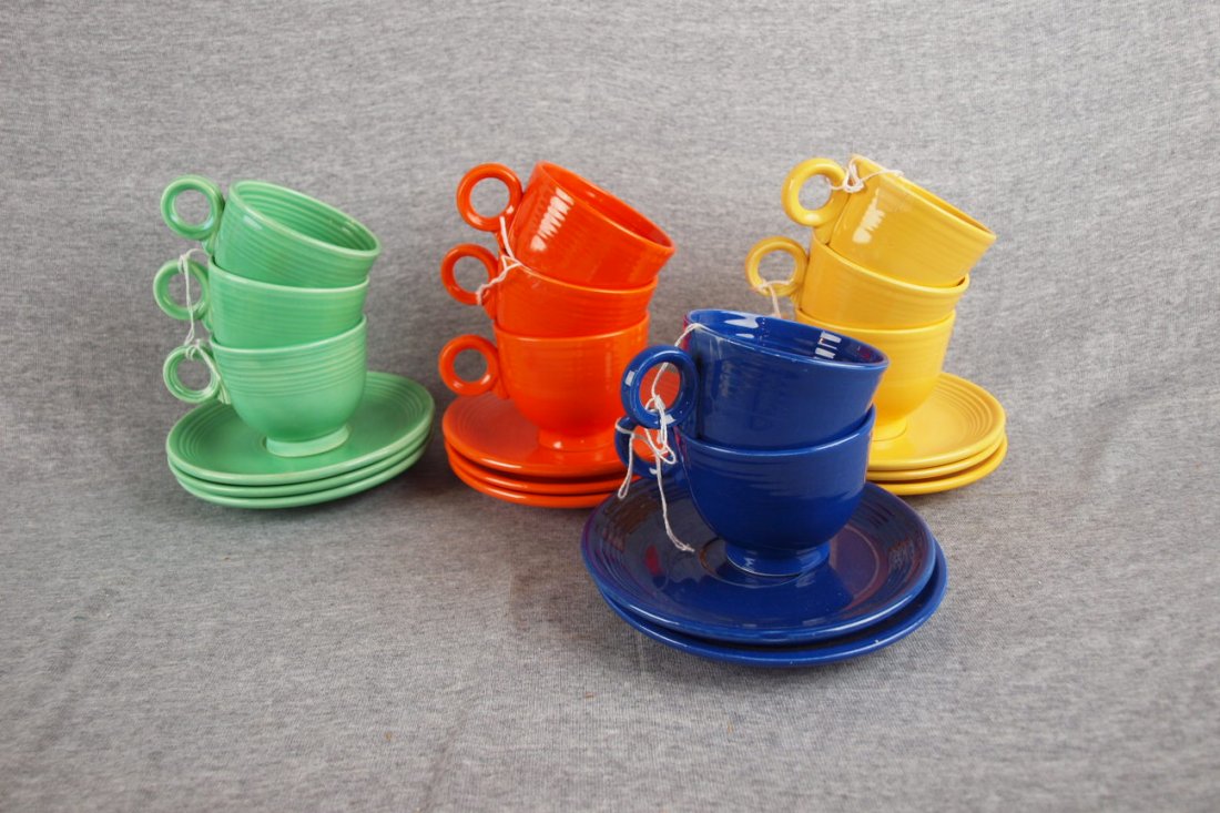 Fiesta flat bottom cup and saucer group - 3 ligh: Fiesta flat bottom cup and saucer group - 3 light green, 3 red, 3 yellow, 2 cobalt