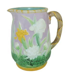 George Jones Majolica Iris pattern jug: c.1875, 8", the body with leaves and blossoms against a pink ground with a handle bound with ribbon. Shape No. 2509 Catalogued and curated by Nicolaus Boston. Flower Family Collection