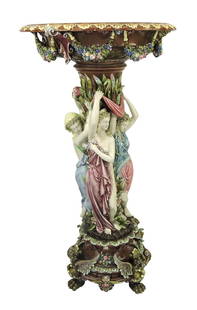 Rare R.M. Krause (Schweidnitz, Prussia): Majolica Renaissance Revival Jardiniere c.1880, 37"h, 18 1/2"w, the central column of leaves and bullrushes with three maidens holding drapes aloft the central bowl, with acanthus border and fruit cor