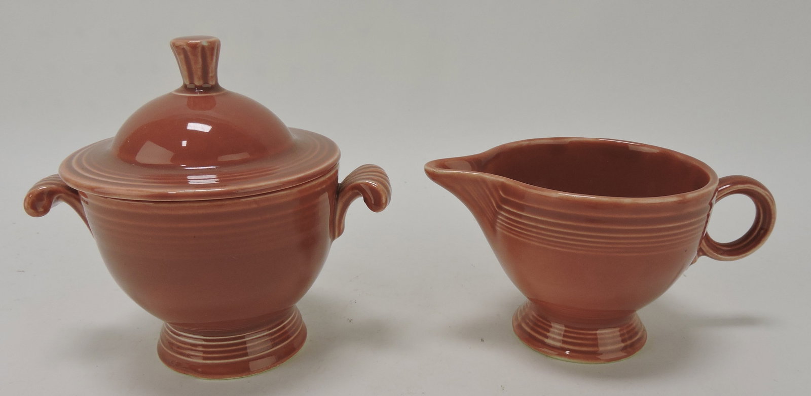 Fiesta cream & sugar, rose, nick to: finial