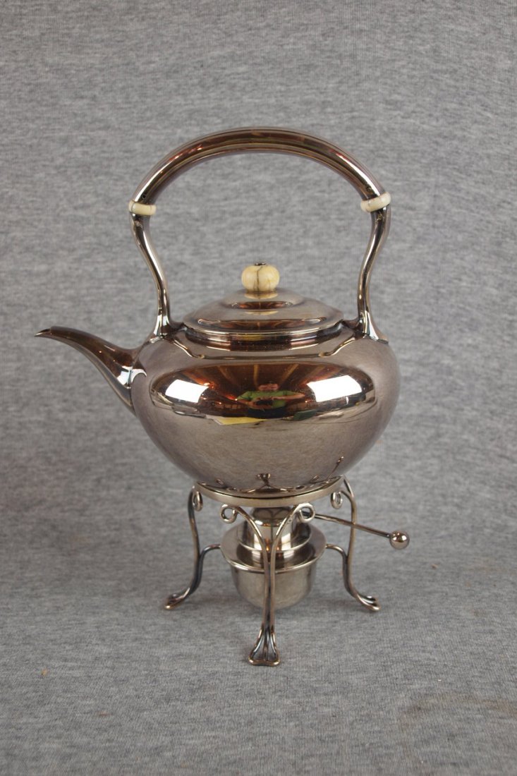 Tiffany & Co. silver soldered Art Deco tea kettle w: Tiffany & Co. silver soldered Art Deco tea kettle with warming stand and bone handle inserts, 10"