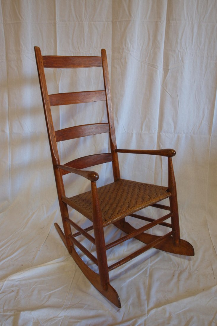Early Shaker ladder back arm rocker with rush bott: Early Shaker ladder back arm rocker with rush bottom seat