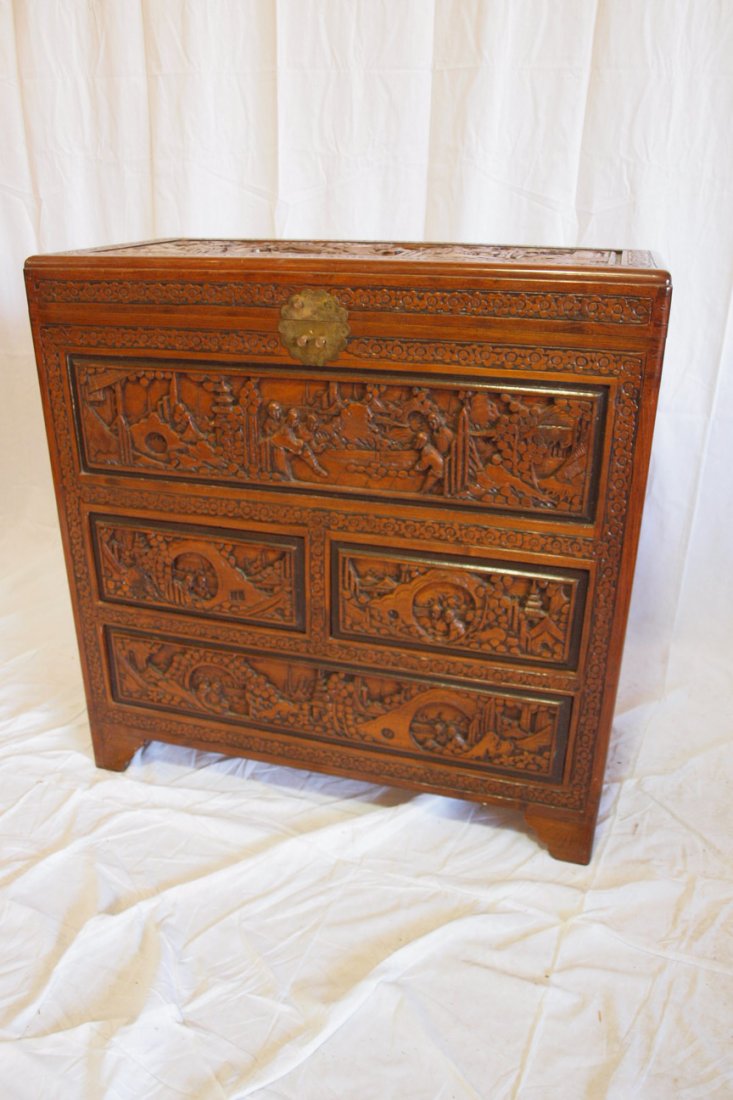 Asian Oriental blanket chest with lift top and 2 : Asian Oriental blanket chest with lift top and 2 drawers, heavily carved top, front and side of Asian people and scenes