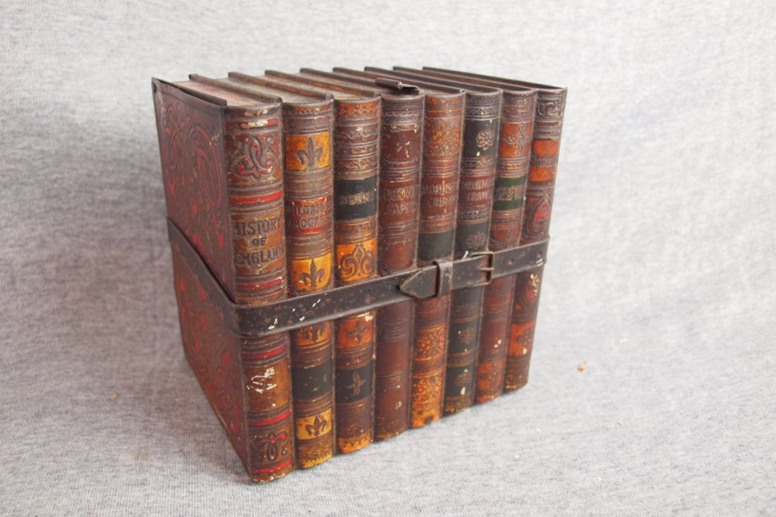 English tin tea caddy in the from of a bundle of : English tin tea caddy in the from of a bundle of books, 6 1/2"h