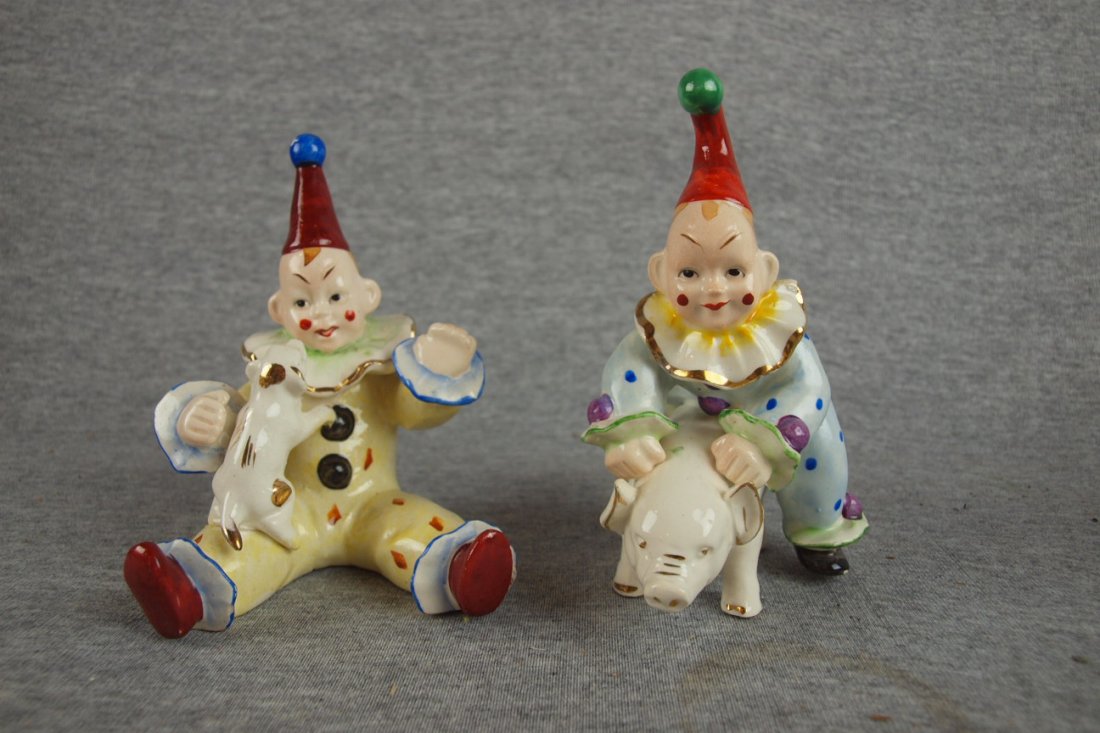 Pair of Occupied Japan clowns - one with pig and : Pair of Occupied Japan clowns - one with pig and the other with a puppy, 5"