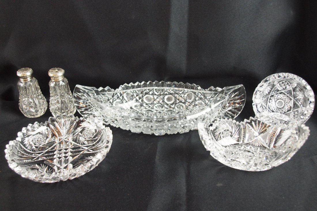 Lot of 5 cut glass pieces - nappy, canoe, salt/pe: Lot of 5 cut glass pieces - nappy, canoe, salt/pepper, ashtray and relish dish