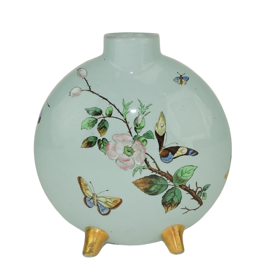 Mintons Aesthetic Movement Moon: Flask c.1875, the celadon ground body with a spray of wild roses and butterflies all upon four 22ct gilded spike feet; 6" Catalogued and curated by Nicolaus Boston