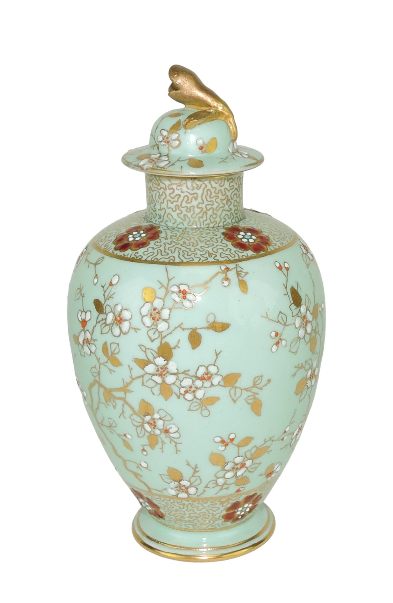 Coalport Porcelain Aesthetic Movement: Ginger Jar & Cover c.1880, the celadon ground body decorated with 22ct gilded leaves and branches with white blossoms; 5 3/4", professional repair to flower finial Catalogued and curated by Nicolaus B