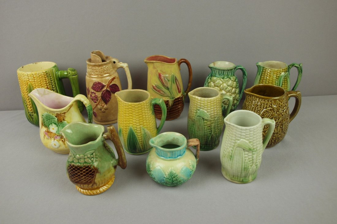 Majolica lot of 12 small pitchers/creamers, various: Majolica lot of 12 small pitchers/creamers, various condition