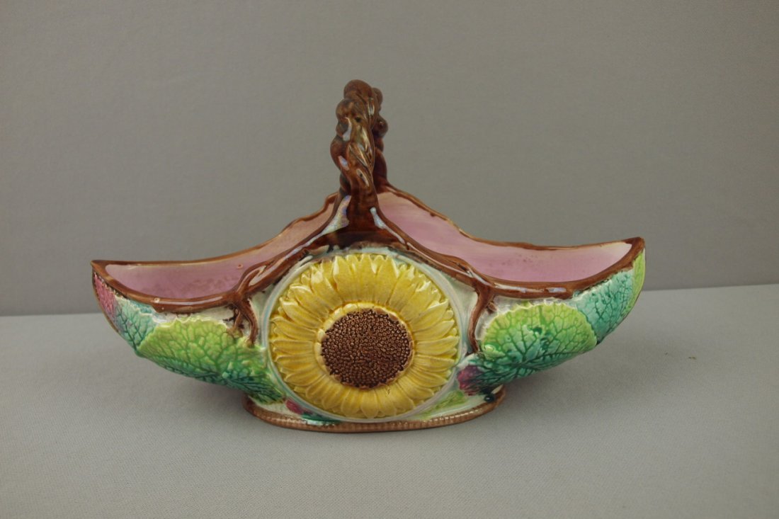 Majolica sunflower and begonia leaf basket, hairli: Majolica sunflower and begonia leaf basket, hairline to handle, 11 3/4"
