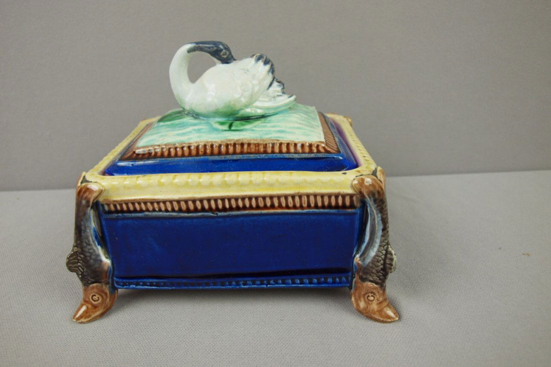Majolica cobalt sardine box with fish corners and: Majolica cobalt sardine box with fish corners and feet, swan finial on lid, repair to swan and nicks to fish