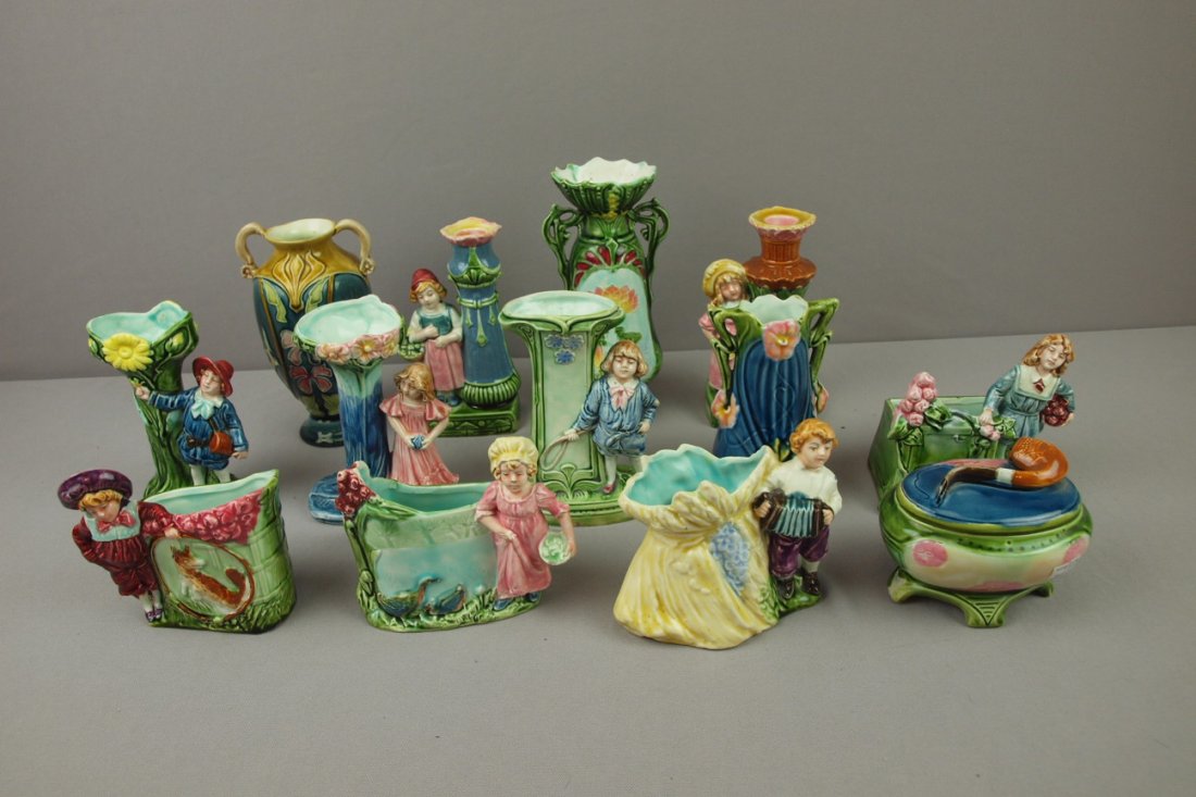 Continental majolica lot of 13 figural planters, : Continental majolica lot of 13 figural planters, vases, candle sticks and humidor, various condition, nice lot