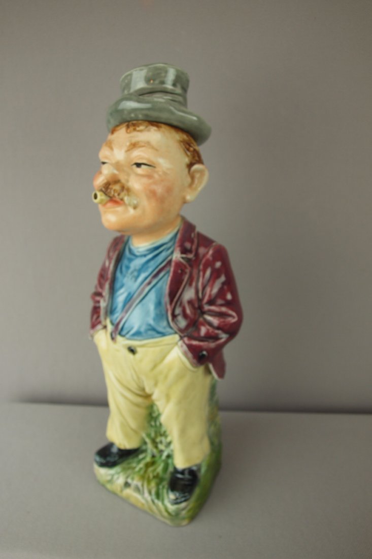 Continental majolica figural bottle of hobo with : Continental majolica figural bottle of hobo with top hat, 12 1/2", professional repair to base
