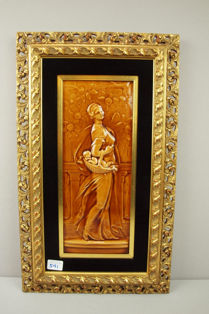MINTON China Works majolica framed tile of lady w: MINTON China Works majolica framed tile of lady with baby in basket, tile size 7" x 17", frame size 15" x 25"