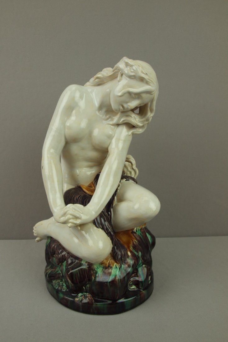 MINTON majolica figure of maiden with long flowin: MINTON majolica figure of maiden with long flowing hair on rock base, 13"h, unusual form