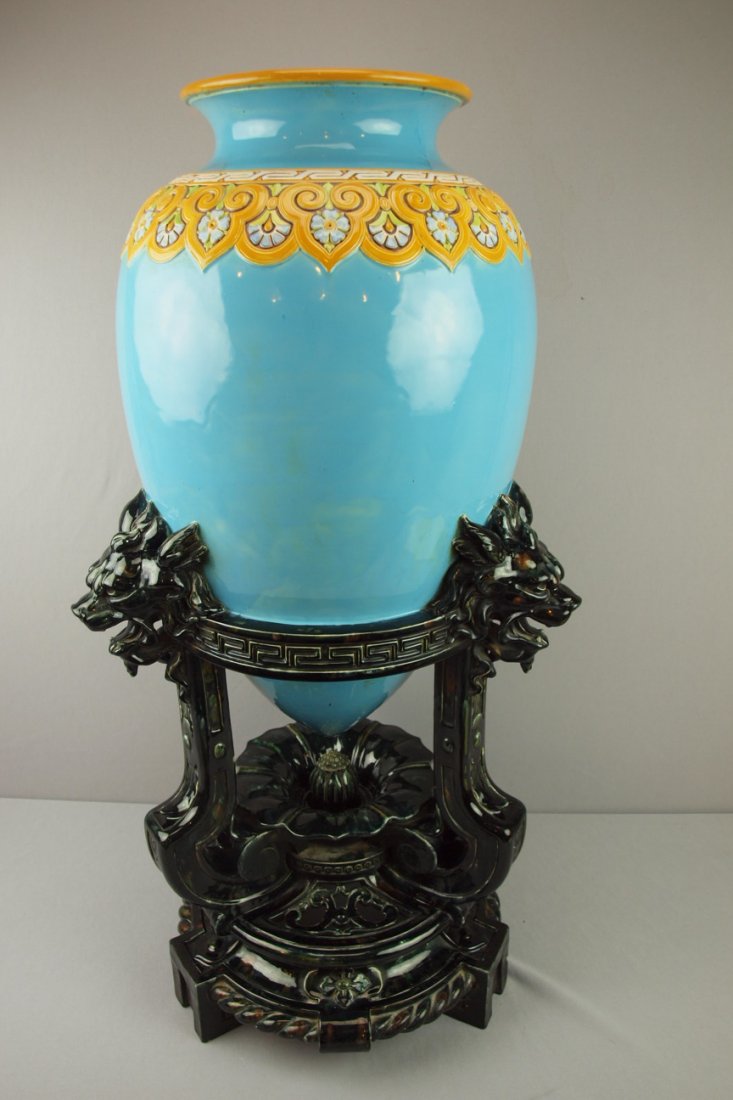 MINTON rare monumental majolica Chinese Bottle va: MINTON rare monumental majolica Chinese Bottle vase, circa 1865 with turquoise ground mounted in black majolica lacquered wood like stand, minor chips to base, 35"h, similar example sold at Sotheby's 