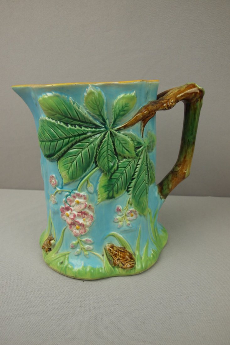 GEORGE JONES majolica rustic pitcher with turquoi: GEORGE JONES majolica rustic pitcher with turquoise ground, frogs at base, great color, 8", professional spout repair, hairline