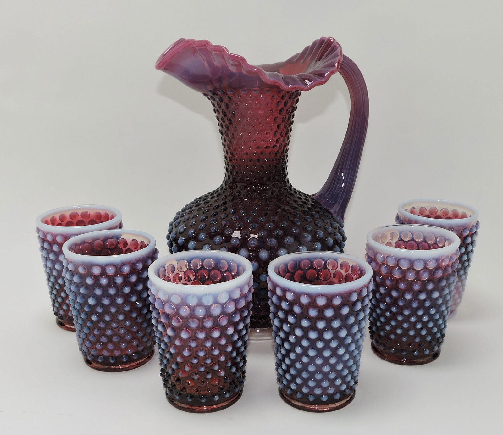 Fenton plum opalescent hobnail 7 pc: water set