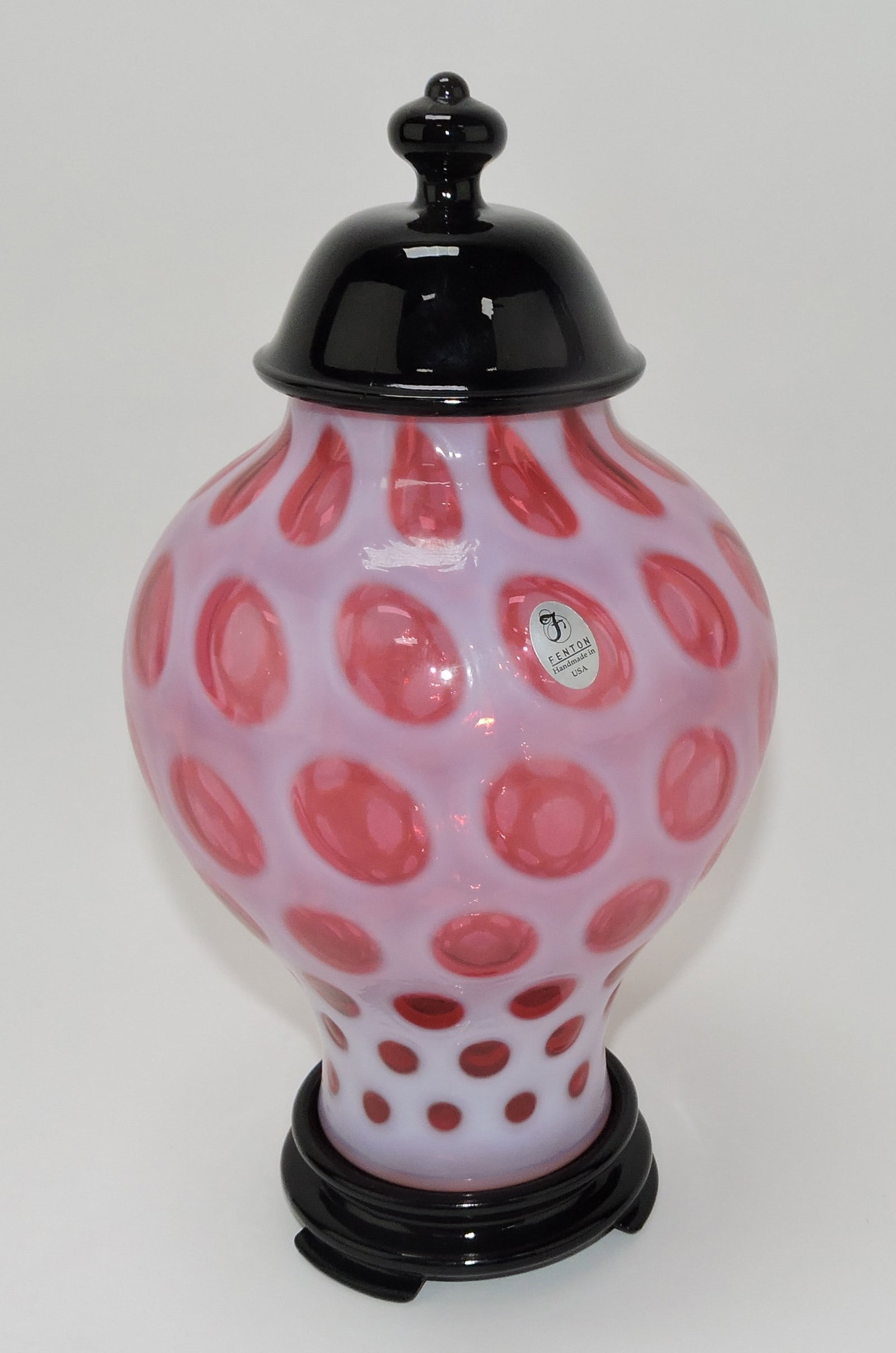 Fenton cranberry opalescent coin spot: urn, 11"