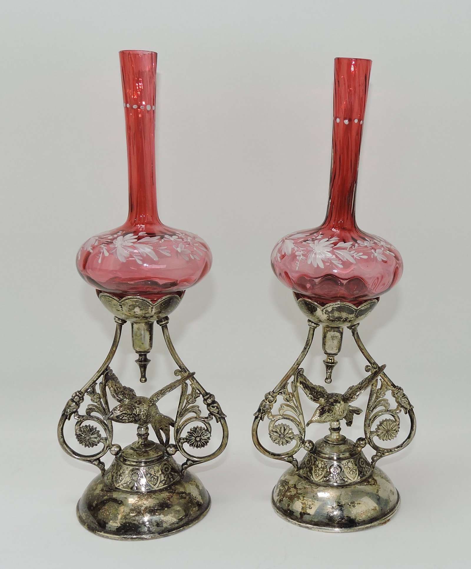 Meriden Silver Co pair of silver plate: mantle vases with birds and cranberry floral enameled vases, 13 1/2"