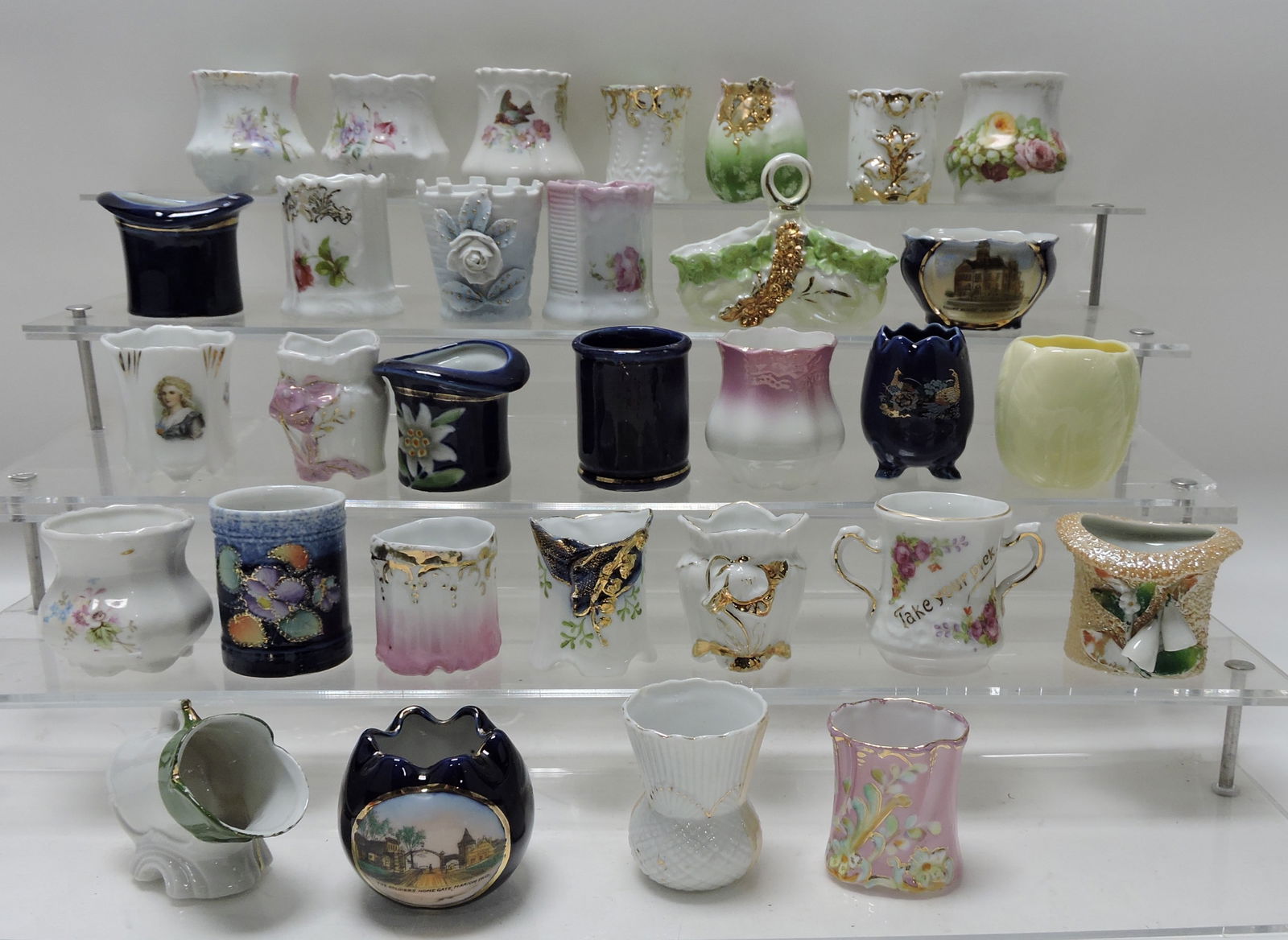 Lot of 31 toothpick holders: .